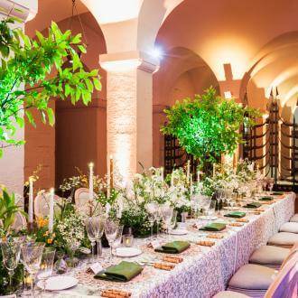 Long table in the Crypt, set for dinner